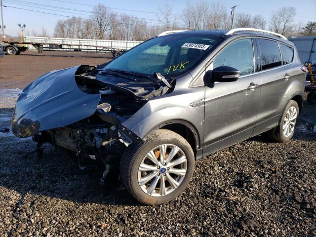 FORD ESCAPE TIT 2017 with VIN 1FMCU9J98HUC08503 - Photo from auction
