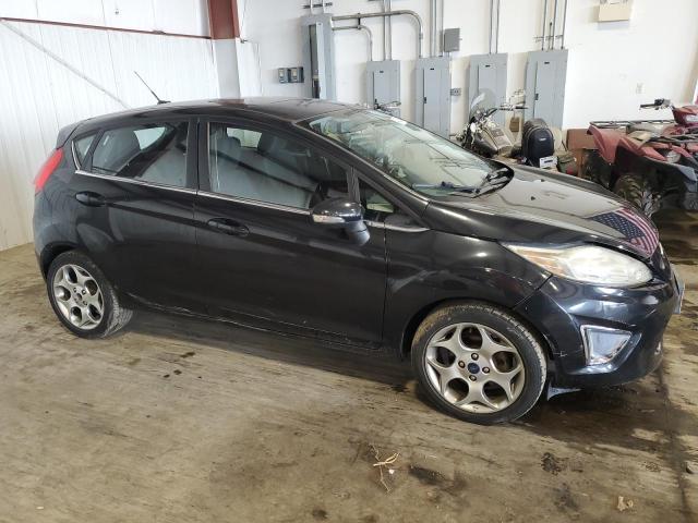 Photo 4 from auction – 2011 FORD FIESTA SES with VIN 3FADP4FJ4BM124282