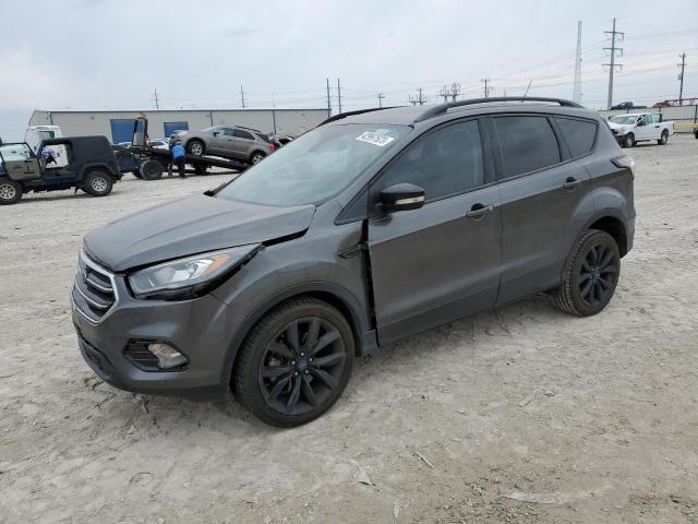 FORD ESCAPE TIT 2017 with VIN 1FMCU0J99HUB94963 - Photo from auction