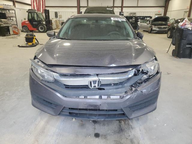 Photo 5 from auction – 2018 HONDA CIVIC LX with VIN 19XFC2F50JE029166