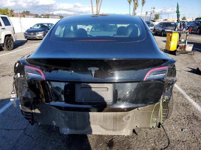 Photo 6 from auction – 2022 TESLA MODEL 3 with VIN 5YJ3E1EA9NF142930