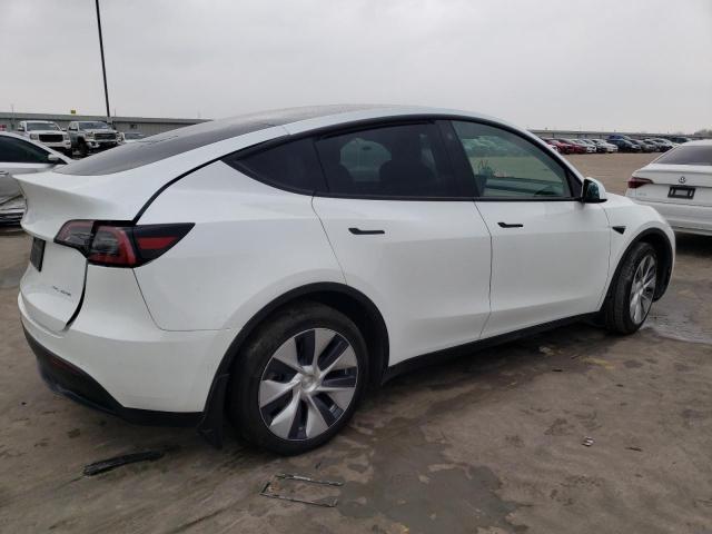 Photo 3 from auction – 2022 TESLA MODEL Y with VIN 7SAYGAEE1NF521474