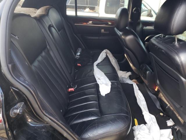 Photo 10 from auction – 2003 LINCOLN TOWN CAR E with VIN 1LNHM81W03Y616629