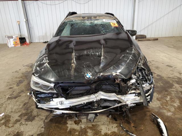Photo 5 from auction – 2018 BMW M5 with VIN WBSJF0C57JB282338