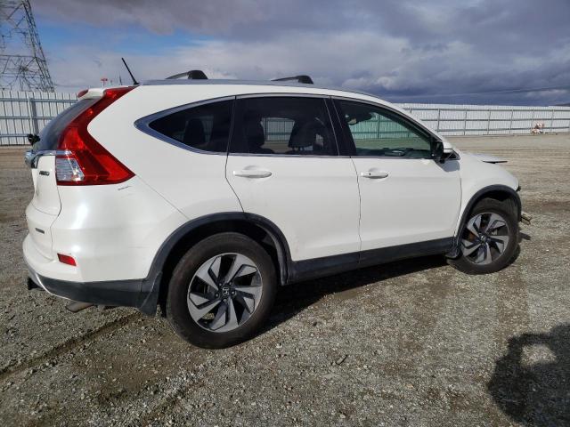 Photo 3 from auction – 2015 HONDA CR-V TOURI with VIN 5J6RM4H93FL070146