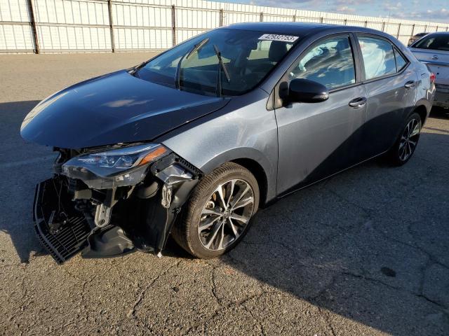 TOYOTA COROLLA L 2019 with VIN 2T1BURHEXKC190688 - Photo from auction