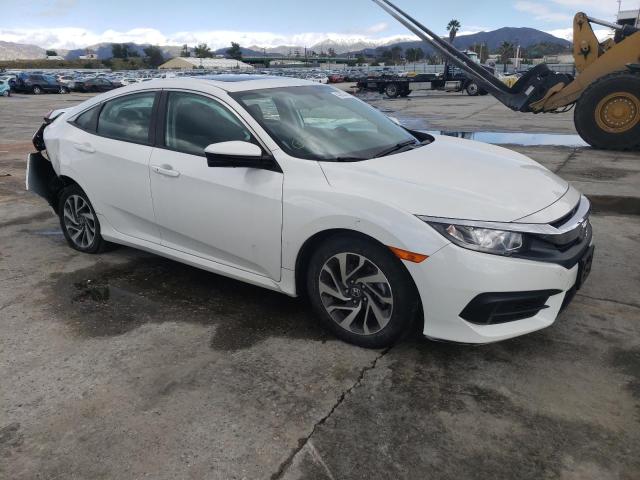 Photo 4 from auction – 2018 HONDA CIVIC EX with VIN 19XFC2F74JE207548