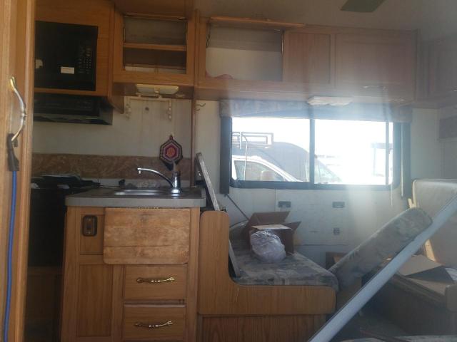 Photo 6 from auction – 1999 FORD ECONOLINE with VIN 1FDXE40S3XHB08418