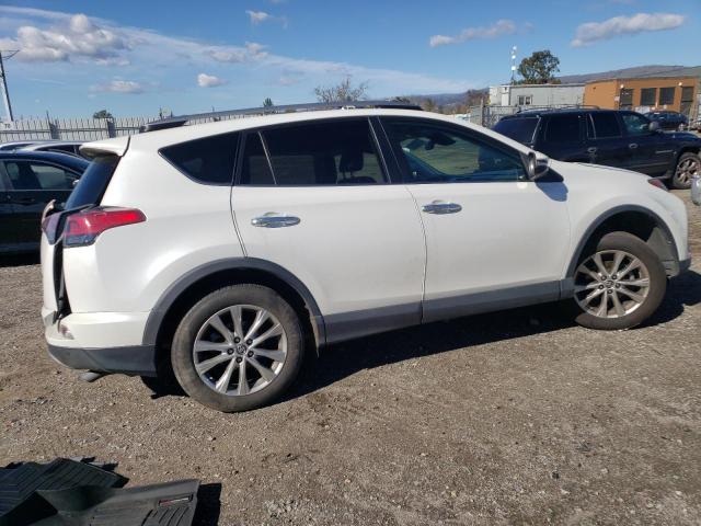 Photo 3 from auction – 2018 TOYOTA RAV4 LIMIT with VIN 2T3YFREV3JW476525