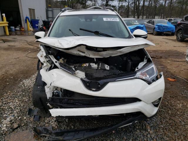 Photo 5 from auction – 2017 TOYOTA RAV4 XLE with VIN JTMWFREV2HD102857