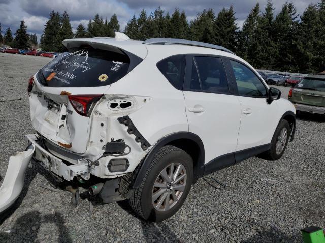 Photo 3 from auction – 2015 MAZDA CX-5 TOURI with VIN JM3KE4CY5F0510671