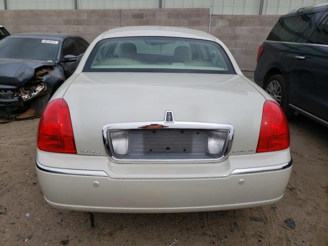 Photo 6 from auction – 2004 LINCOLN TOWN CAR U with VIN 1LNHM83W94Y604123