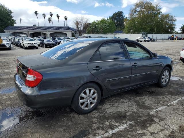 Photo 3 from auction – 2002 TOYOTA CAMRY LE with VIN JTDBE32K520070297