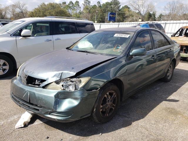 TOYOTA CAMRY LE 2002 with VIN 4T1BE32K92U585937 - Photo from auction
