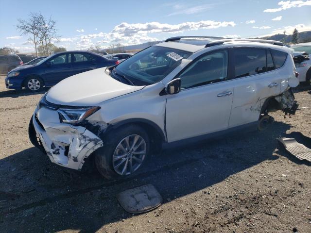 TOYOTA RAV4 LIMIT 2018 with VIN 2T3YFREV3JW476525 - Photo from auction