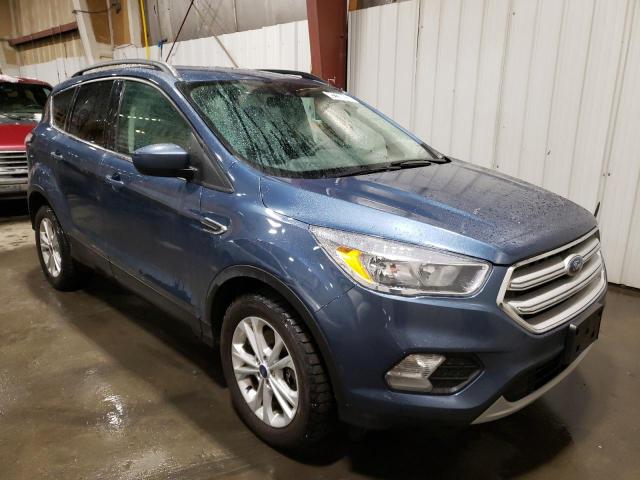 Photo 4 from auction – 2018 FORD ESCAPE SE with VIN 1FMCU9GD5JUC90871