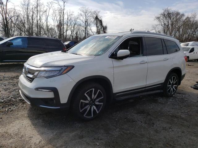 HONDA PILOT TOUR 2019 with VIN 5FNYF6H92KB005759 - Photo from auction