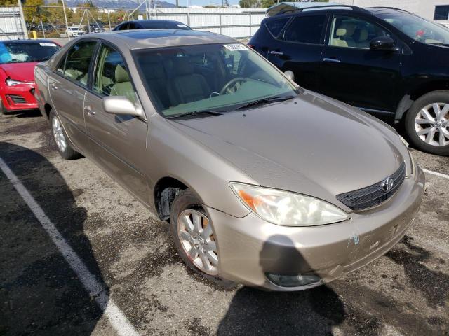 Photo 4 from auction – 2003 TOYOTA CAMRY LE with VIN JTDBE32K030226182