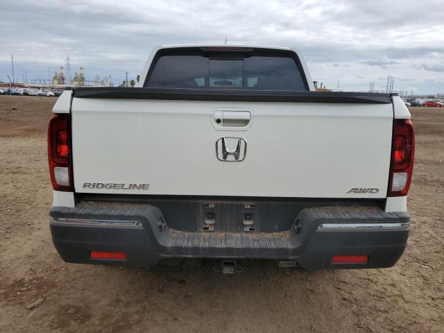 Photo 6 from auction – 2019 HONDA RIDGELINE with VIN 5FPYK3F55KB016224
