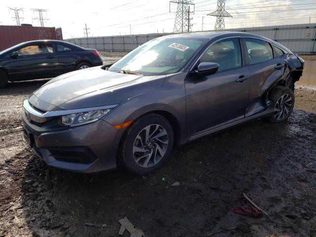 HONDA CIVIC EX 2018 with VIN 19XFC2F75JE033814 - Photo from auction