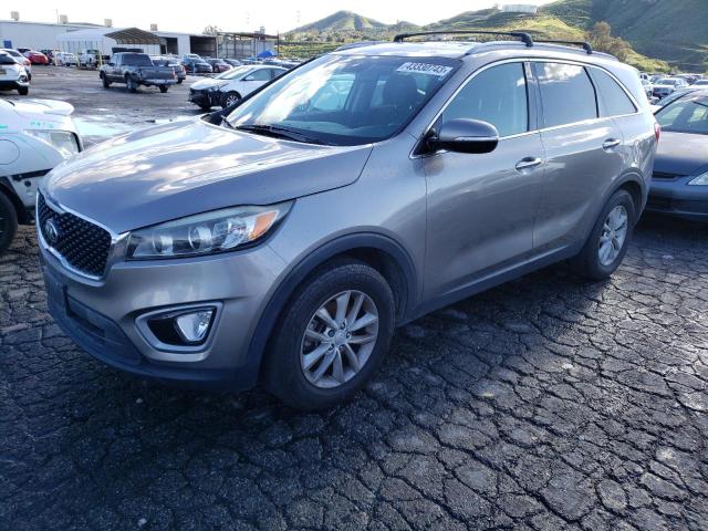 KIA SORENTO LX 2016 with VIN 5XYPG4A34GG016197 - Photo from auction