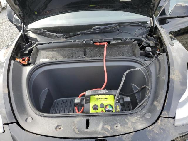 Photo 11 from auction – 2022 TESLA MODEL Y with VIN 7SAYGDEE4NF481523