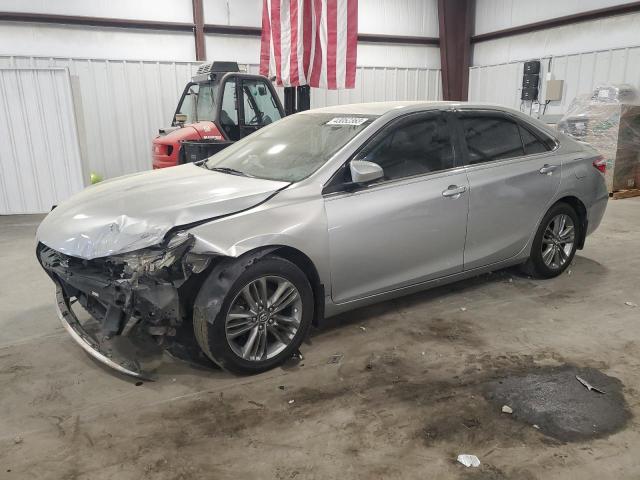 TOYOTA CAMRY LE 2017 with VIN 4T1BF1FKXHU323462 - Photo from auction