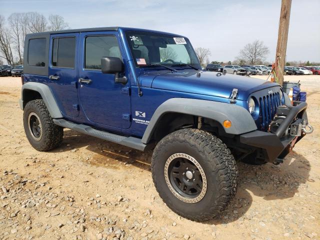 Photo 4 from auction – 2009 JEEP WRANGLER U with VIN 1J4GA39139L770496