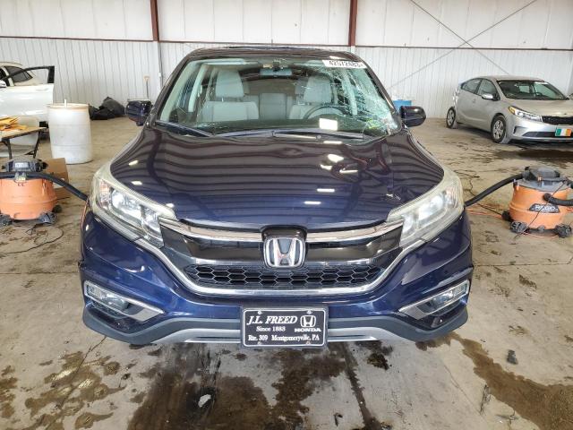 Photo 5 from auction – 2015 HONDA CR-V EX with VIN 2HKRM4H56FH664950
