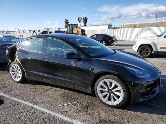 Photo 4 from auction – 2022 TESLA MODEL 3 with VIN 5YJ3E1EA9NF142930