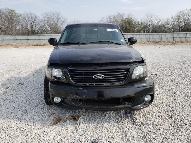 Photo 5 from auction – 2003 FORD F150 SVT L with VIN 2FTRF07333CA77190
