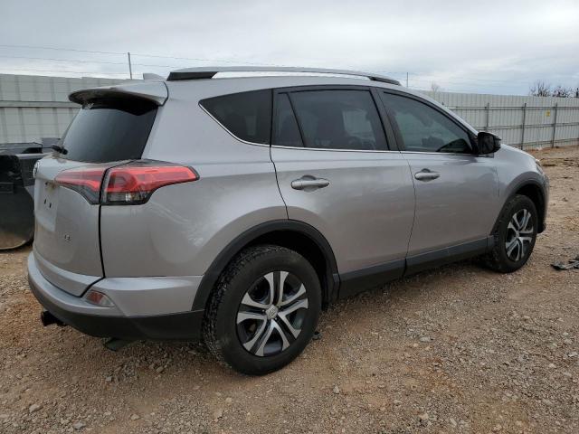Photo 3 from auction – 2018 TOYOTA RAV4 LE with VIN JTMZFREV6JD124072