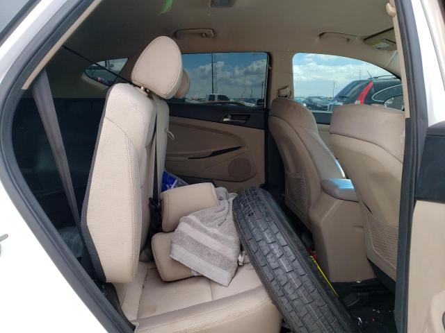 Photo 11 from auction – 2016 HYUNDAI TUCSON SE with VIN KM8J23A48GU106020