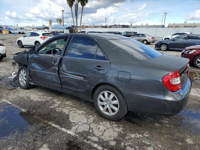 Photo 2 from auction – 2002 TOYOTA CAMRY LE with VIN JTDBE32K520070297