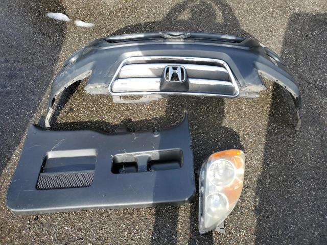 Photo 13 from auction – 2006 HONDA CR-V EX with VIN JHLRD78866C010668