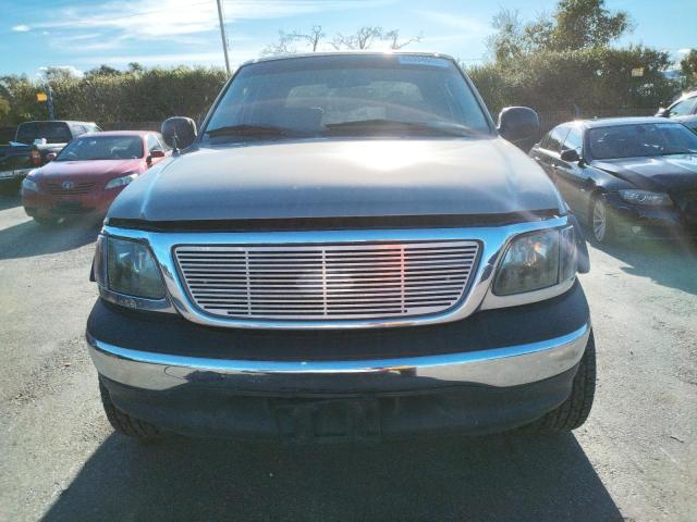 Photo 5 from auction – 2003 FORD F150 SUPER with VIN 1FTRW07L03KA76316