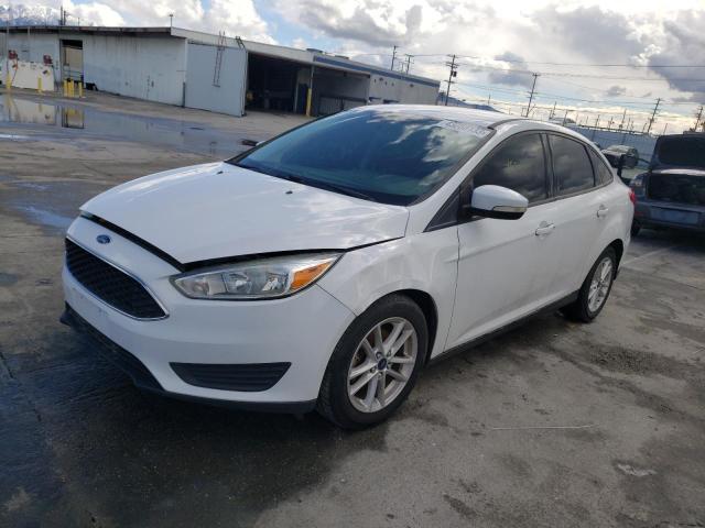 FORD FOCUS SE 2016 with VIN 1FADP3F23GL392381 - Photo from auction