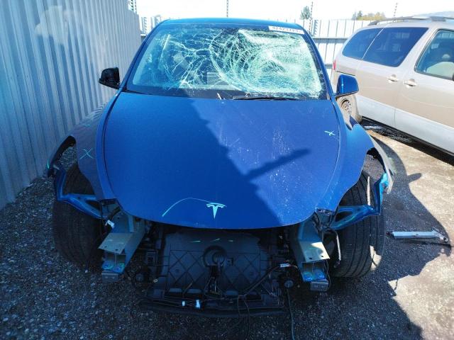Photo 5 from auction – 2023 TESLA MODEL Y with VIN 7SAYGDEE3PF630359