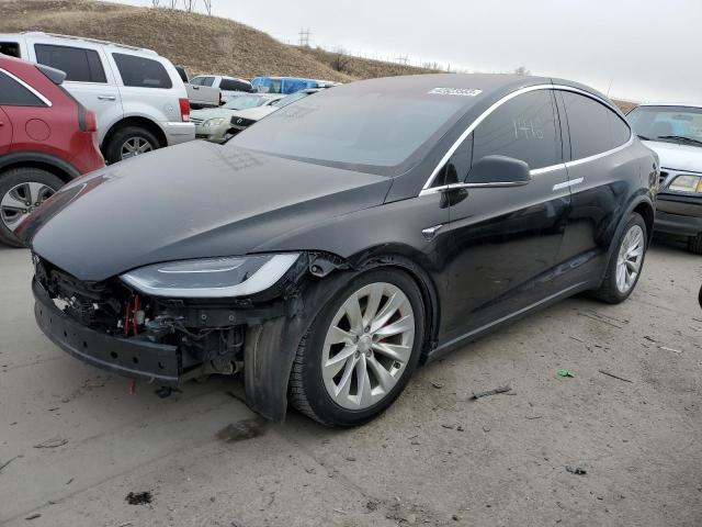 TESLA MODEL X 2018 with VIN 5YJXCAE23JF111537 - Photo from auction