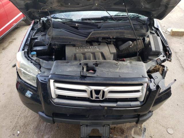 Photo 11 from auction – 2006 HONDA PILOT EX with VIN 2HKYF18526H510191