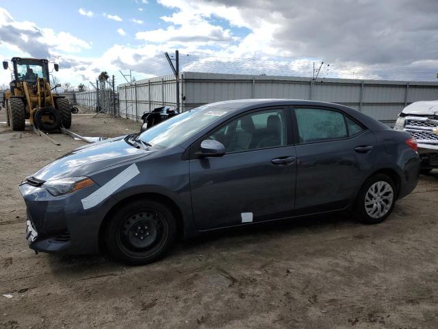 TOYOTA COROLLA L 2019 with VIN 2T1BURHEXKC206355 - Photo from auction