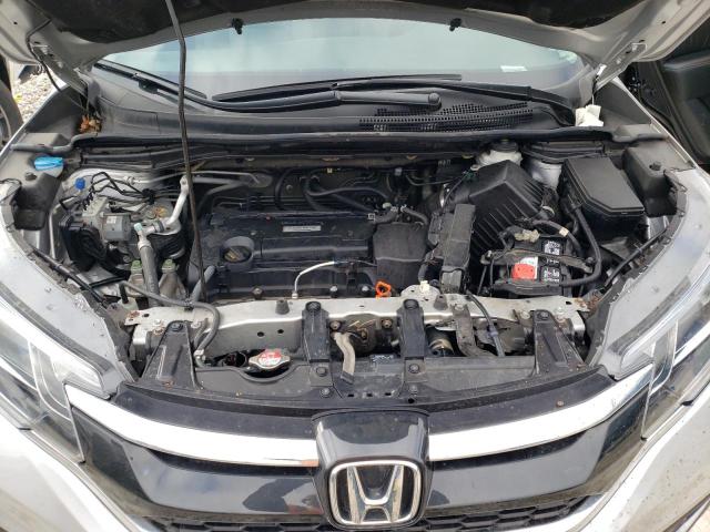 Photo 11 from auction – 2016 HONDA CR-V LX with VIN 5J6RM4H36GL120079