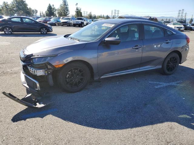HONDA CIVIC LX 2019 with VIN 19XFC2F64KE210992 - Photo from auction