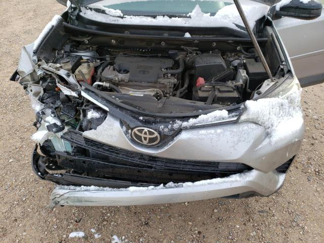 Photo 12 from auction – 2018 TOYOTA RAV4 LE with VIN 2T3ZFREV3JW408861