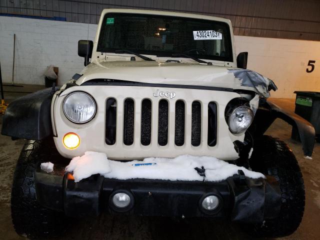 Photo 5 from auction – 2011 JEEP WRANGLER U with VIN 1J4HA3H17BL525809