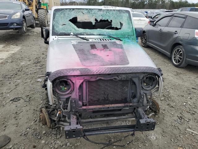 Photo 5 from auction – 2011 JEEP WRANGLER U with VIN 1J4BA3H18BL614102
