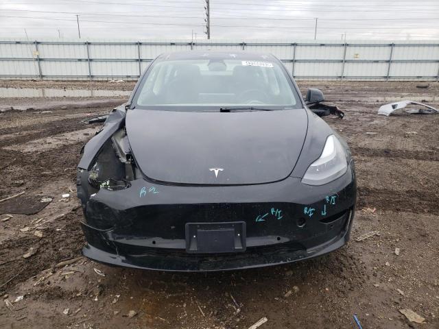 Photo 5 from auction – 2022 TESLA MODEL 3 with VIN 5YJ3E1EA9NF290009