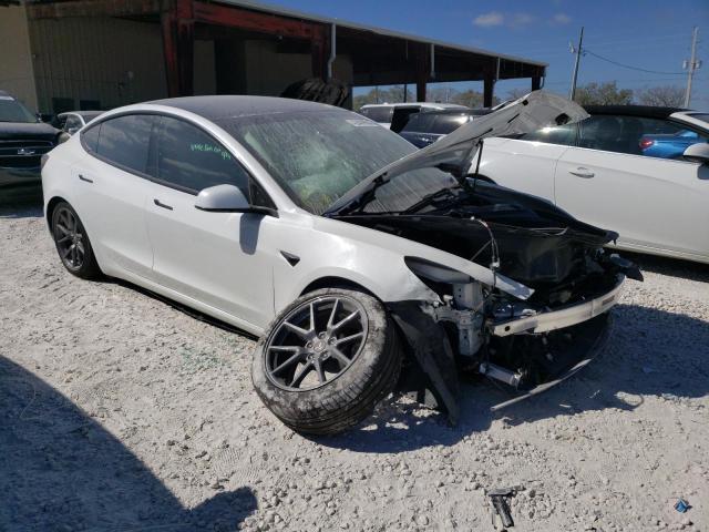 Photo 4 from auction – 2021 TESLA MODEL 3 with VIN 5YJ3E1EA8MF097526
