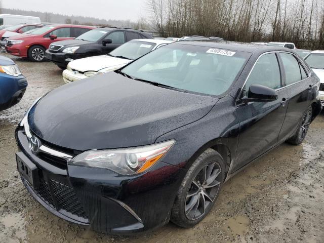 TOYOTA CAMRY LE 2015 with VIN 4T1BF1FKXFU475688 - Photo from auction