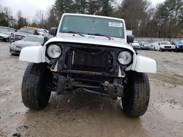 Photo 5 from auction – 2016 JEEP WRANGLER U with VIN 1C4BJWEG5GL256996